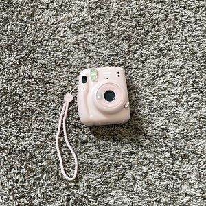 Pink polaroid camera